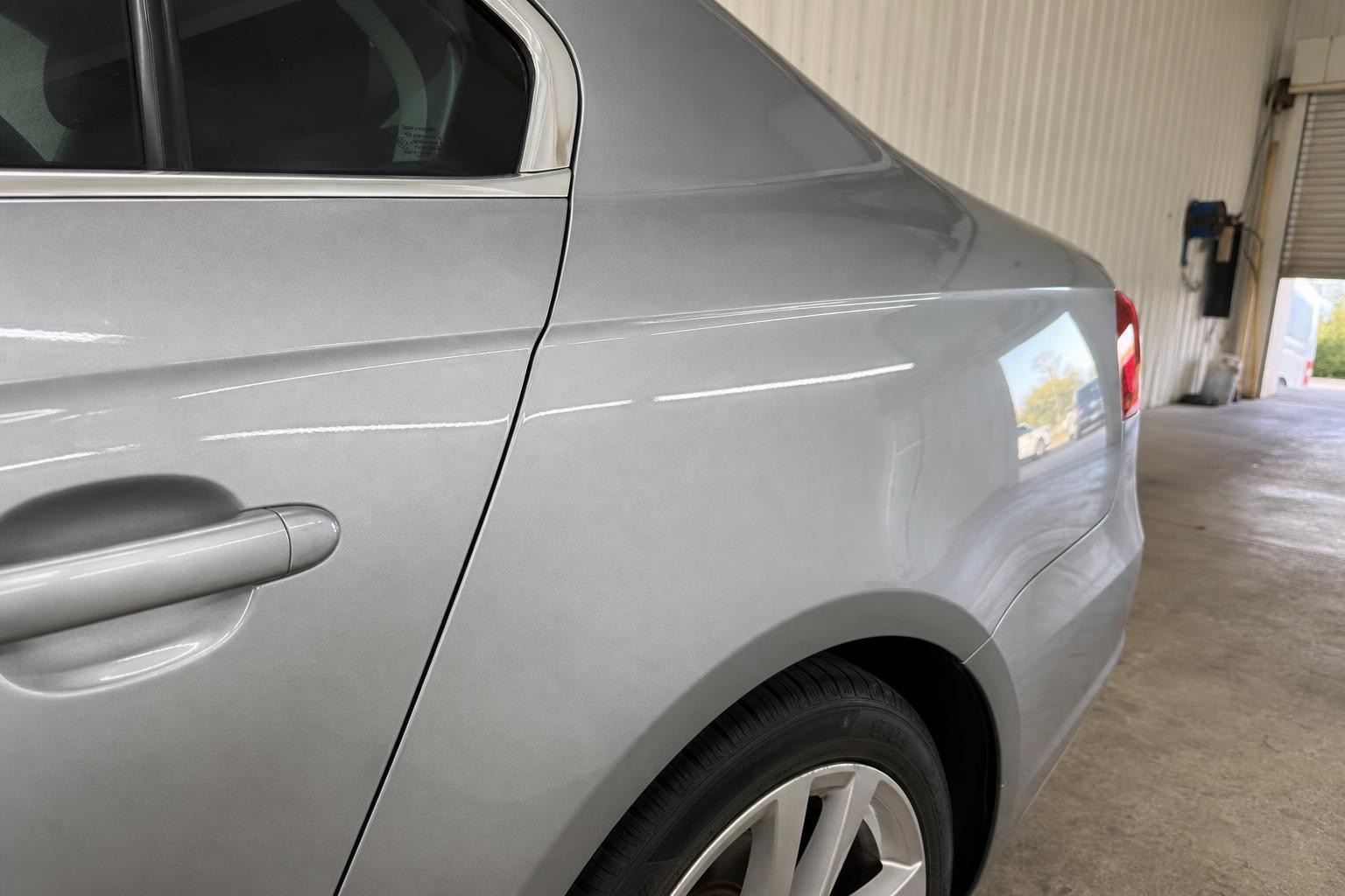 Volkswagen Passat — scratches on the door